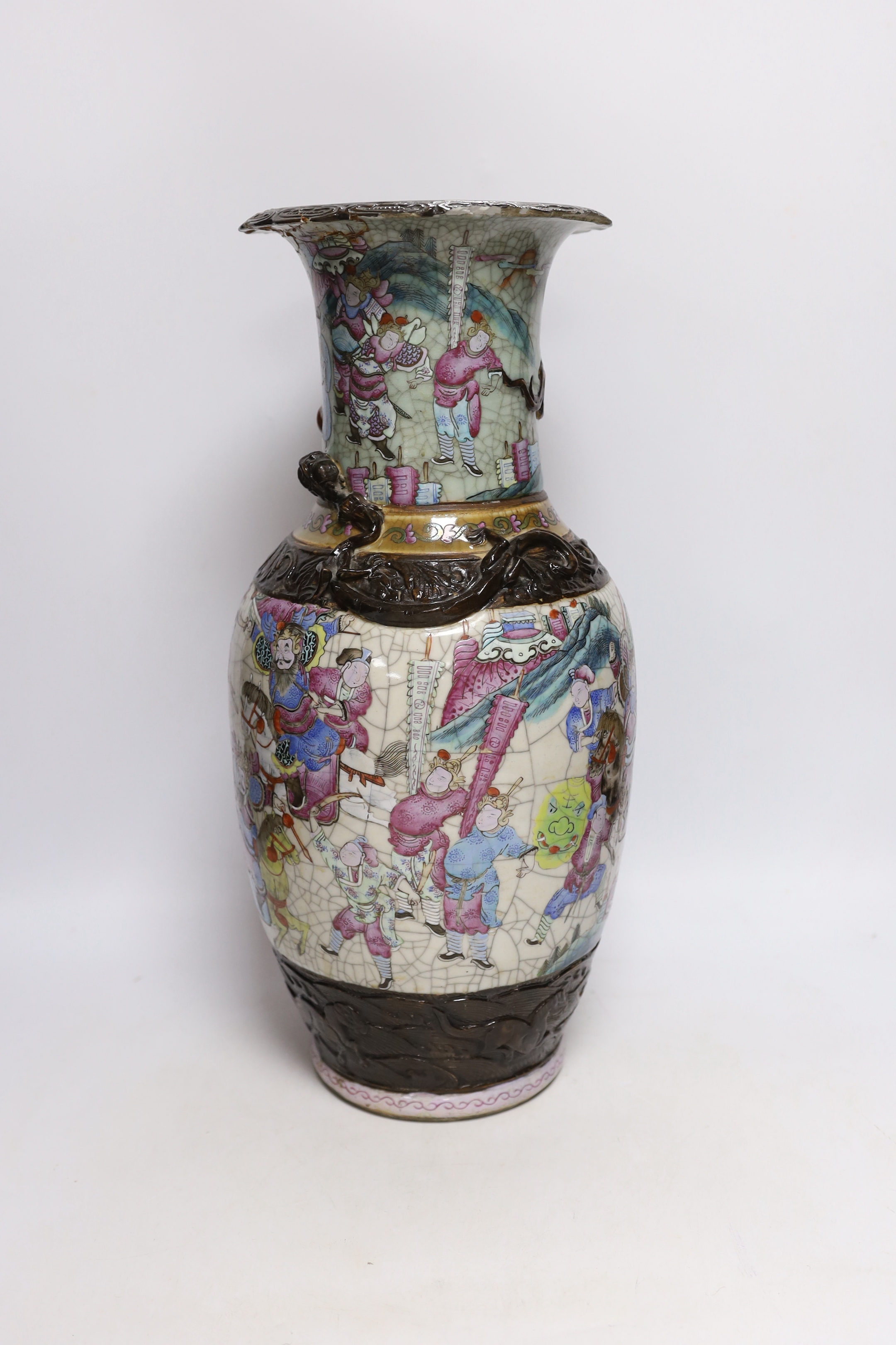 A Chinese famille rose crackle glaze 'warriors' vase, late 19th century, 46cm high, cracked